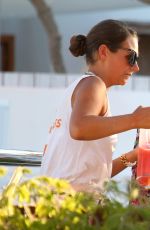 CASEY BATCHELOR in Bikini Top at Ocean Beach in Ibiza