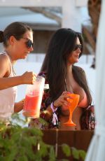 CASEY BATCHELOR in Bikini Top at Ocean Beach in Ibiza