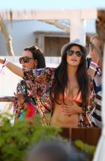 CASEY BATCHELOR in Bikini Top at Ocean Beach in Ibiza