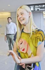 ELLE FANNING at Narita International Airport in Tokyo