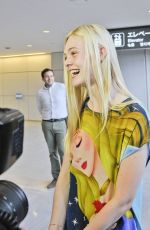 ELLE FANNING at Narita International Airport in Tokyo