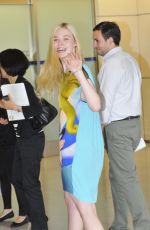 ELLE FANNING at Narita International Airport in Tokyo