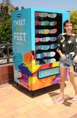 EMMA ROBERTS at Old Navy Flip-flop Vending Machine in Los Angeles