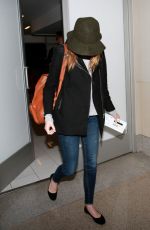 EMMA STONE Arrives at Los Angeles International Airport