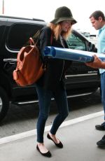EMMA STONE Arrives at Los Angeles International Airport