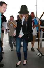 EMMA STONE Arrives at Los Angeles International Airport