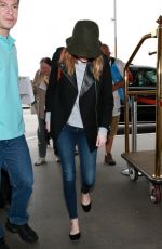 EMMA STONE Arrives at Los Angeles International Airport