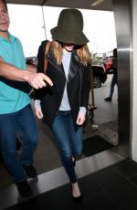 EMMA STONE Arrives at Los Angeles International Airport