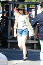 EMMA STONE in Denim Shorts Out and About in Soho