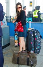 EMMY ROSSUM Arrives at JFK Airport in New York