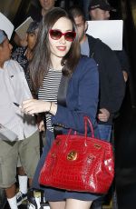 EMMY ROSSUM in Skirt at LAX Airport in Los Angeles