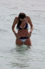 IMOGEN THOMAS in Bikini at the Beach in Italy