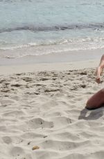 IMOGEN THOMAS in Bikini at the Beach in Italy