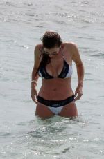 IMOGEN THOMAS in Bikini at the Beach in Italy