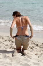 IMOGEN THOMAS in Bikini at the Beach in Italy
