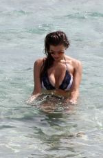 IMOGEN THOMAS in Bikini at the Beach in Italy