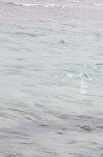 IMOGEN THOMAS in Bikini at the Beach in Italy