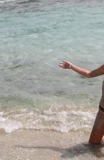 IMOGEN THOMAS in Bikini at the Beach in Italy