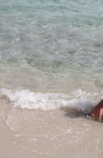 IMOGEN THOMAS in Bikini at the Beach in Italy