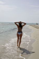 IMOGEN THOMAS in Bikini at the Beach in Italy