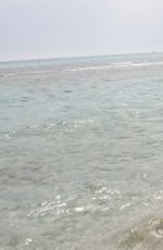 IMOGEN THOMAS in Bikini at the Beach in Italy
