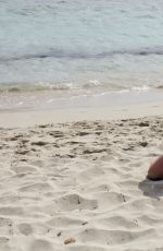 IMOGEN THOMAS in Bikini at the Beach in Italy