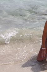 IMOGEN THOMAS in Bikini at the Beach in Italy