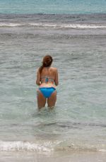IMOGEN THOMAS in Bikini at the Beach in Spain