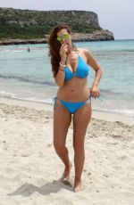 IMOGEN THOMAS in Bikini at the Beach in Spain