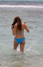 IMOGEN THOMAS in Bikini at the Beach in Spain