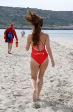 IMOGEN THOMAS in Swimsuit on the Beach in Spain