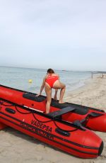 IMOGEN THOMAS in Swimsuit on the Beach in Spain