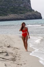 IMOGEN THOMAS in Swimsuit on the Beach in Spain