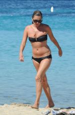 KATE MOSS in Bikini at a Beach in Ibiza