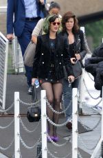KATY PERRY Boarding at Ferry on the Thames River in London