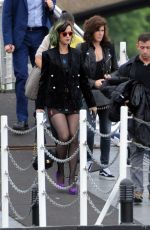 KATY PERRY Boarding at Ferry on the Thames River in London