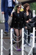 KATY PERRY Boarding at Ferry on the Thames River in London