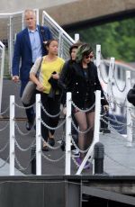 KATY PERRY Boarding at Ferry on the Thames River in London