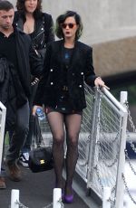 KATY PERRY Boarding at Ferry on the Thames River in London
