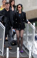 KATY PERRY Boarding at Ferry on the Thames River in London