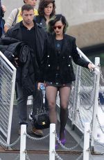 KATY PERRY Boarding at Ferry on the Thames River in London