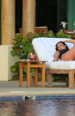 KIM KARDASHIAN in Bikini at a Pool