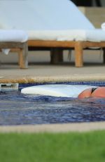 KIM KARDASHIAN in Bikini at a Pool