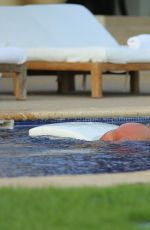 KIM KARDASHIAN in Bikini at a Pool