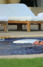KIM KARDASHIAN in Bikini at a Pool