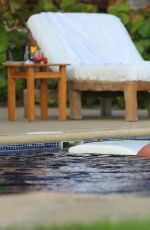 KIM KARDASHIAN in Bikini at a Pool