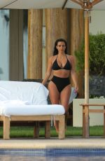 KIM KARDASHIAN in Bikini at a Pool