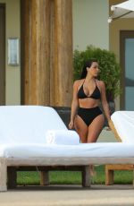 KIM KARDASHIAN in Bikini at a Pool