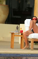 KIM KARDASHIAN in Bikini at a Pool