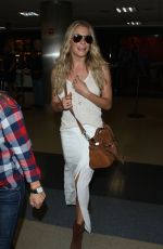 LEANN RIMES Arrives at LAX Airport in Los Angeles 0306